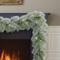 9ft. Pre-Lit Flocked Garland with Warm White LED Lights